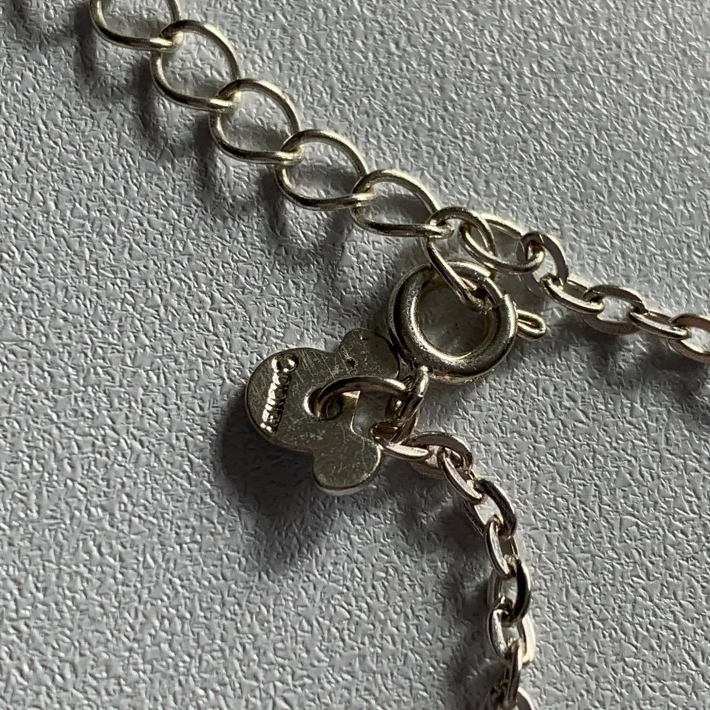 Disney girls soccer necklace.
